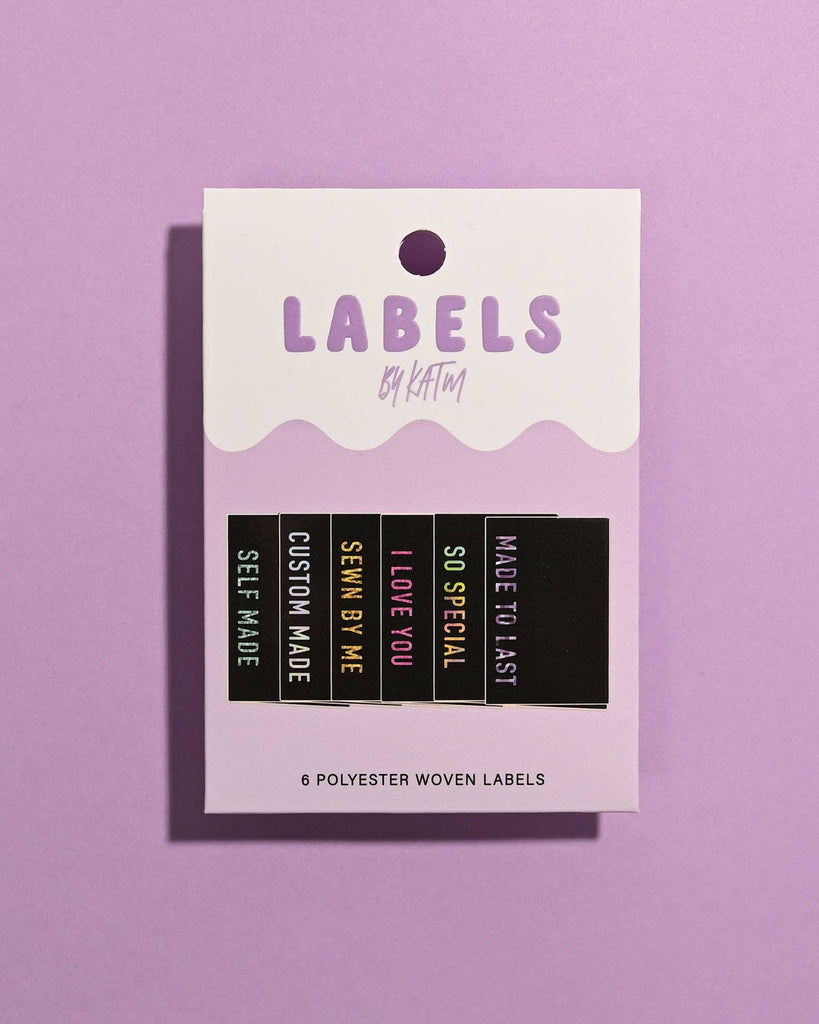 Kylie and The Machine - Metallic Side Seam (Black) Woven Labels | Case of 6 labels